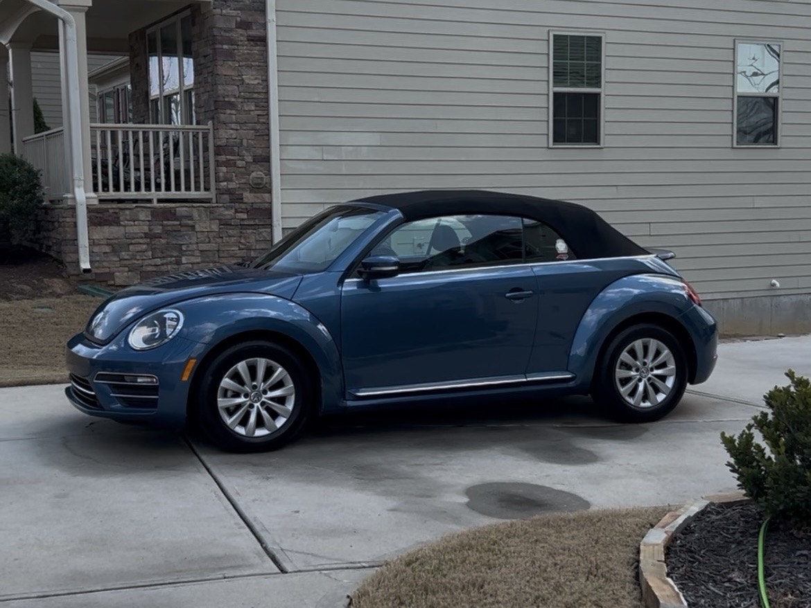 Freshly detailed convertible in a driveway